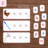 Montessori Pink Series CVC word-building cards with pictures of a hen, pen, and net, shown with red and blue movable alphabet letter tiles for preschool phonics and early reading practice.